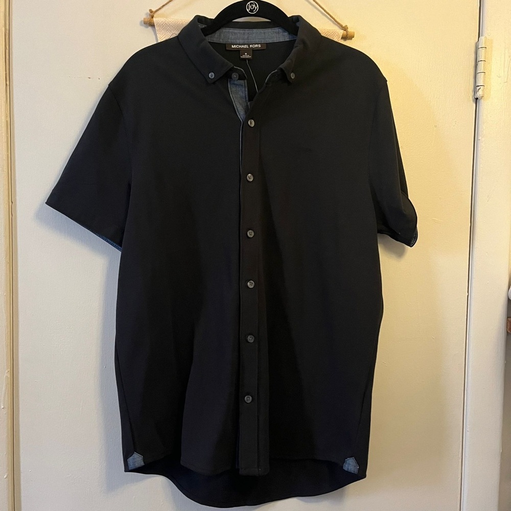 Michael kors polo shirt. New with tag.